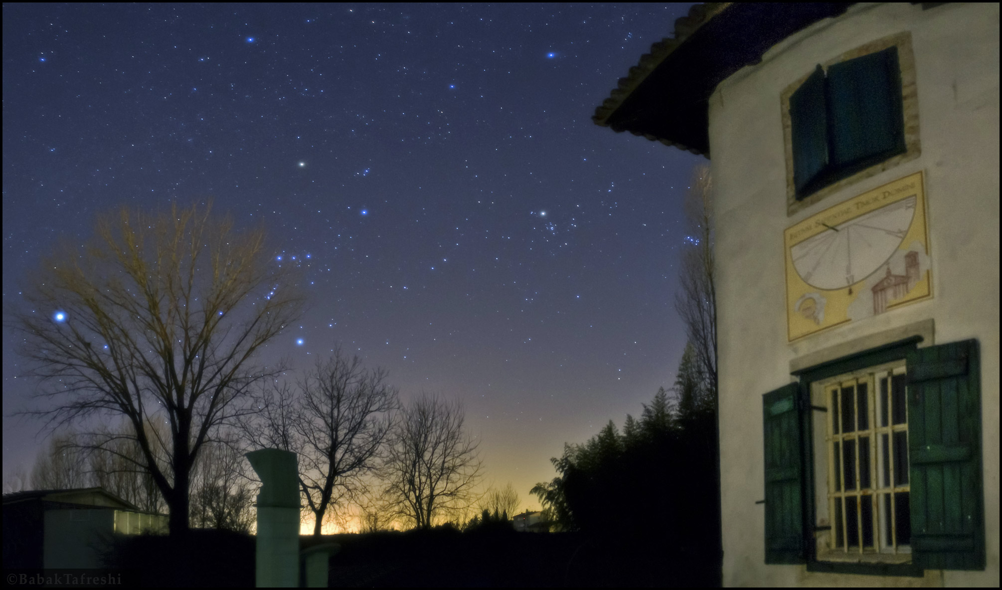 Winter stars shine above the western horizon of Ai
